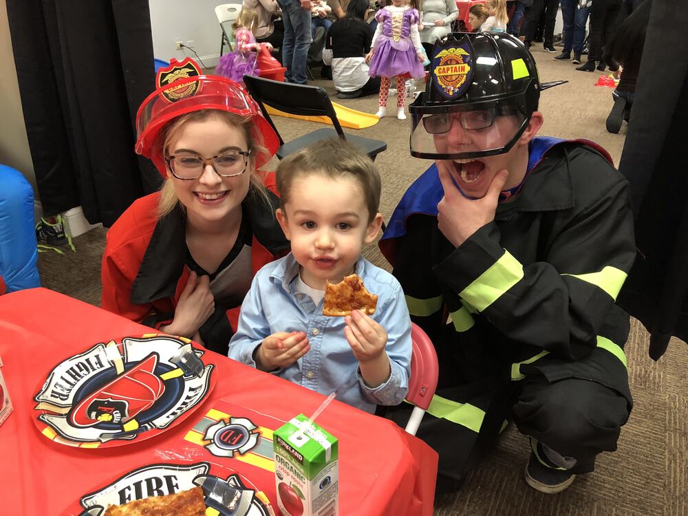 Firefighter character with a child